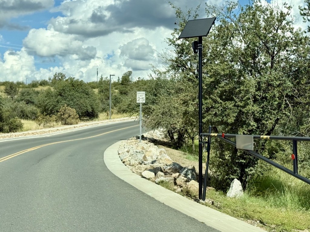 Flock camera on Rummel Road just west of Willow Creek Road, at the curve by the 25-mph sign.